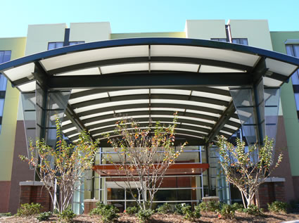 Steel Stitch awning over the entrance of a large building
