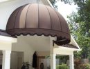 brown awning with scalloped edges